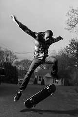 Image showing Skateboarder Doing Tricks