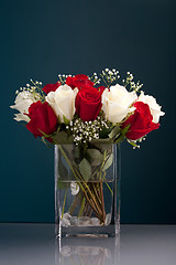 Image showing Red and White Roses in a Vase