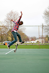 Image showing Skateboarder Performing Tricks