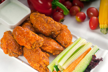 Image showing  buffalo chicken wings served with pinzimonio