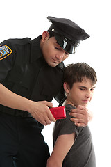 Image showing Police officer with teen  uvenile delinquent