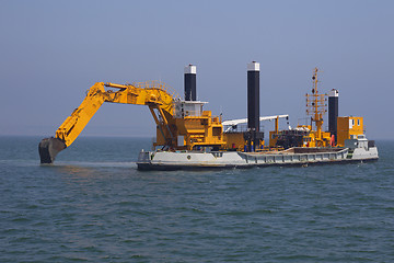 Image showing Excavators set out to sea to deepen the seabed