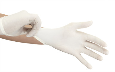 Image showing Pulling on surgical glove
