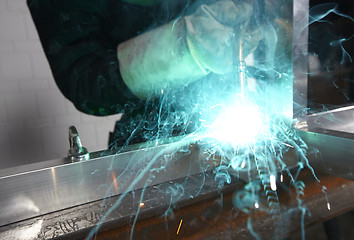 Image showing Welder with sparks