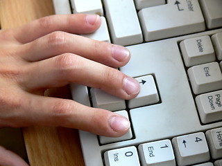 Image showing Hand on keyboard