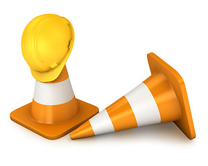 Image showing Two roadcones and yellow helmet