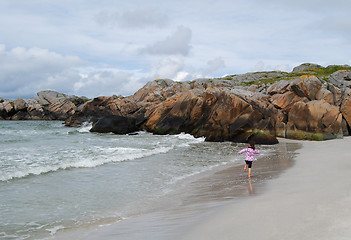 Image showing running on beach