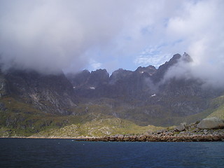 Image showing Mountains in clouds