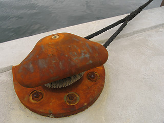 Image showing Big rusty bollard