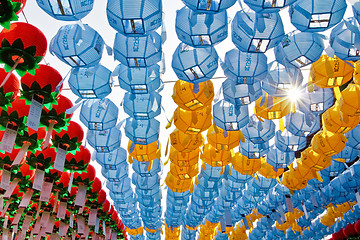 Image showing Colorful lanterns with sun rays