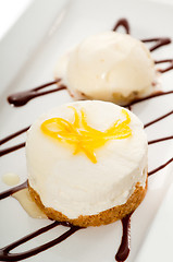 Image showing  lemon mousse served whith lemon peel on top