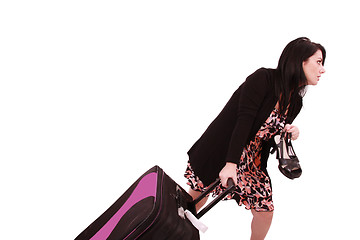 Image showing woman missed his flight.  Running with the shoes on hand and lug