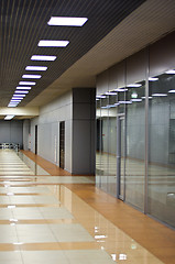 Image showing Wall with glass partitions and doors in office building