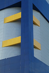 Image showing Detail of blue and yellow building