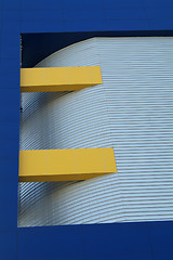 Image showing Detail of blue and yellow building