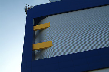 Image showing Detail of blue and yellow building