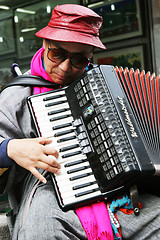 Image showing Street musician busking