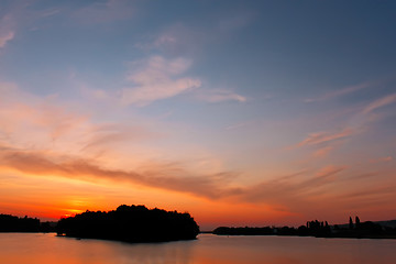 Image showing Multicolour cloudscape over reservoir