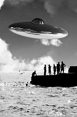 Image showing UFO Over The Coast With People In Foreground