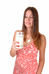 Image showing Girl doesnâ€™t like milk.