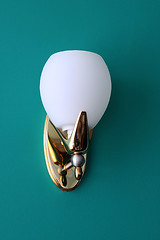 Image showing Wall Lamp Against Green Background