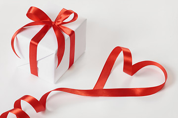 Image showing gift box and red ribbon