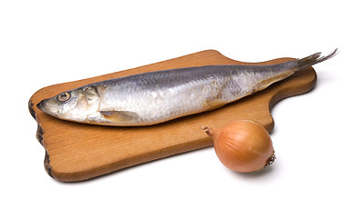 Image showing Herring with onion on kitchen board