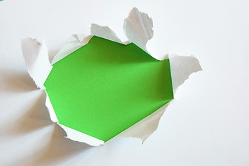 Image showing green hole in blank sheet paper