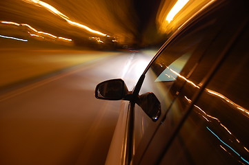 Image showing night drive with car in motion 