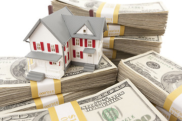 Image showing Small House with Stacks of Hundred Dollar Bills