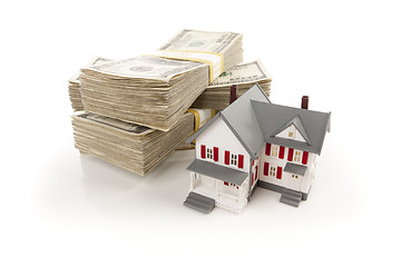 Image showing Small House with Stacks of Hundred Dollar Bills