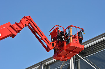 Image showing red hydraulic construction cradle 