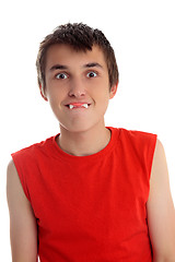 Image showing Funny face boy with dracula teeth candy