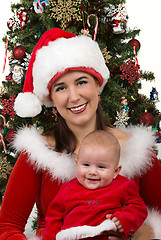 Image showing Mommy and Baby Santa