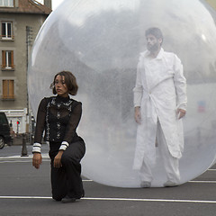 Image showing Man walking in a ball