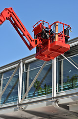 Image showing red hydraulic construction cradle 