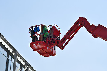 Image showing red hydraulic construction cradle 