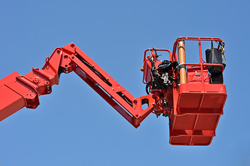 Image showing red hydraulic construction cradle 