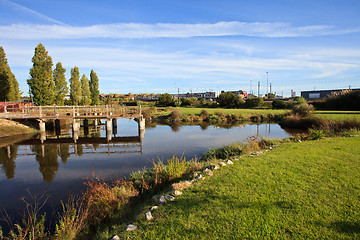 Image showing The train the garden and the lake.