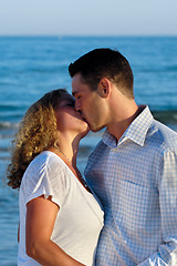 Image showing Young couple are kissing.