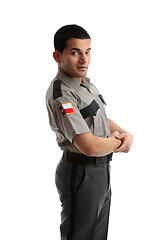 Image showing Male worker in uniform standing sideways