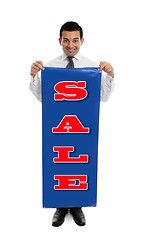 Image showing Man holding a SALE sign