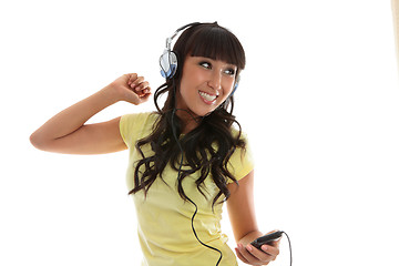 Image showing Beautiful girl enjoying music