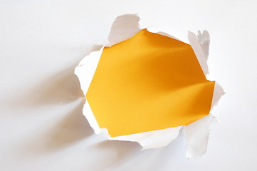 Image showing yellow hole in paper