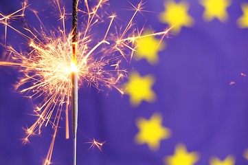 Image showing euro union flag and sparkler