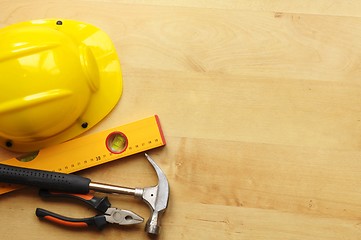 Image showing hard hat and tool