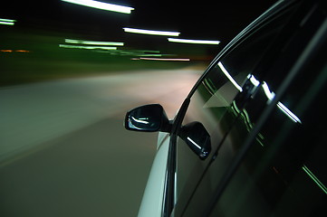 Image showing night drive with car in motion 