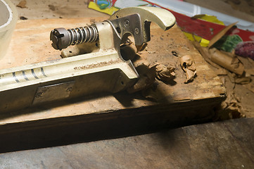 Image showing hand made cigar trimming machine