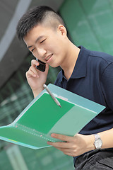 Image showing Portrait of businessman calling by phone 