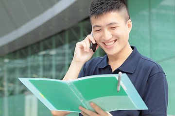 Image showing Portrait of businessman calling by phone 